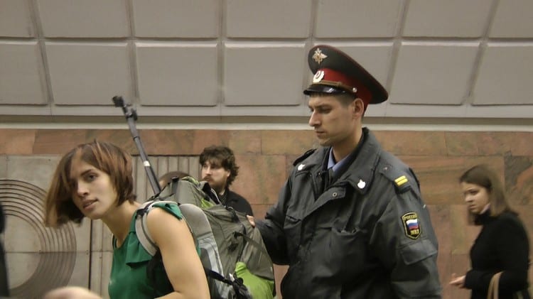 Pussy_versus_Putin_Film_Frame,_Nadezhda_Tolokonnikova_Is_Taken_into_Police_Custody_Moscow_Metro_2011